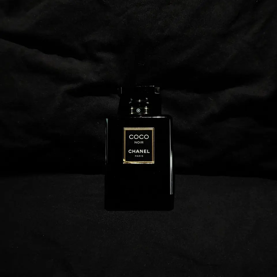 Coco Noir by Chanel — my first product shoot. Black on black, lit just enough.